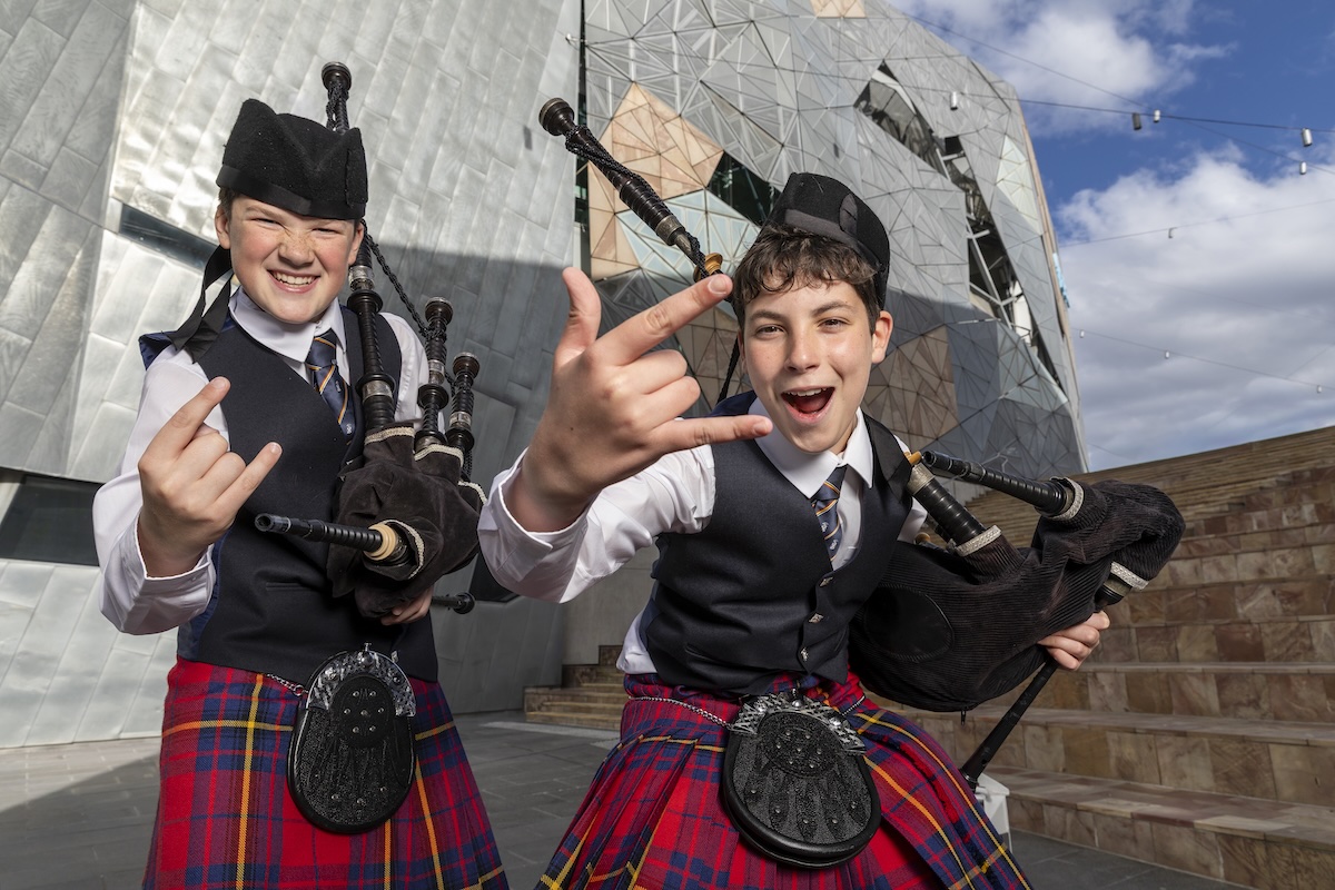 paulcashmere's tweet card. Melbourne celebrates AC/DC’s return with hundreds of pipers recreating It’s A Long Way To The Top at Fed Square.