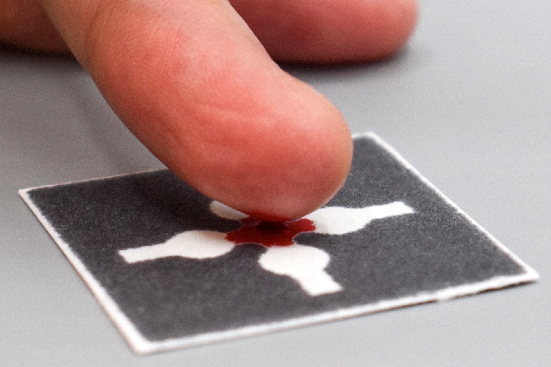 TuftsUniversity's tweet card. Blood, Sweat, and Water: New Paper Analytical Devices Easily Track Health and Environment
