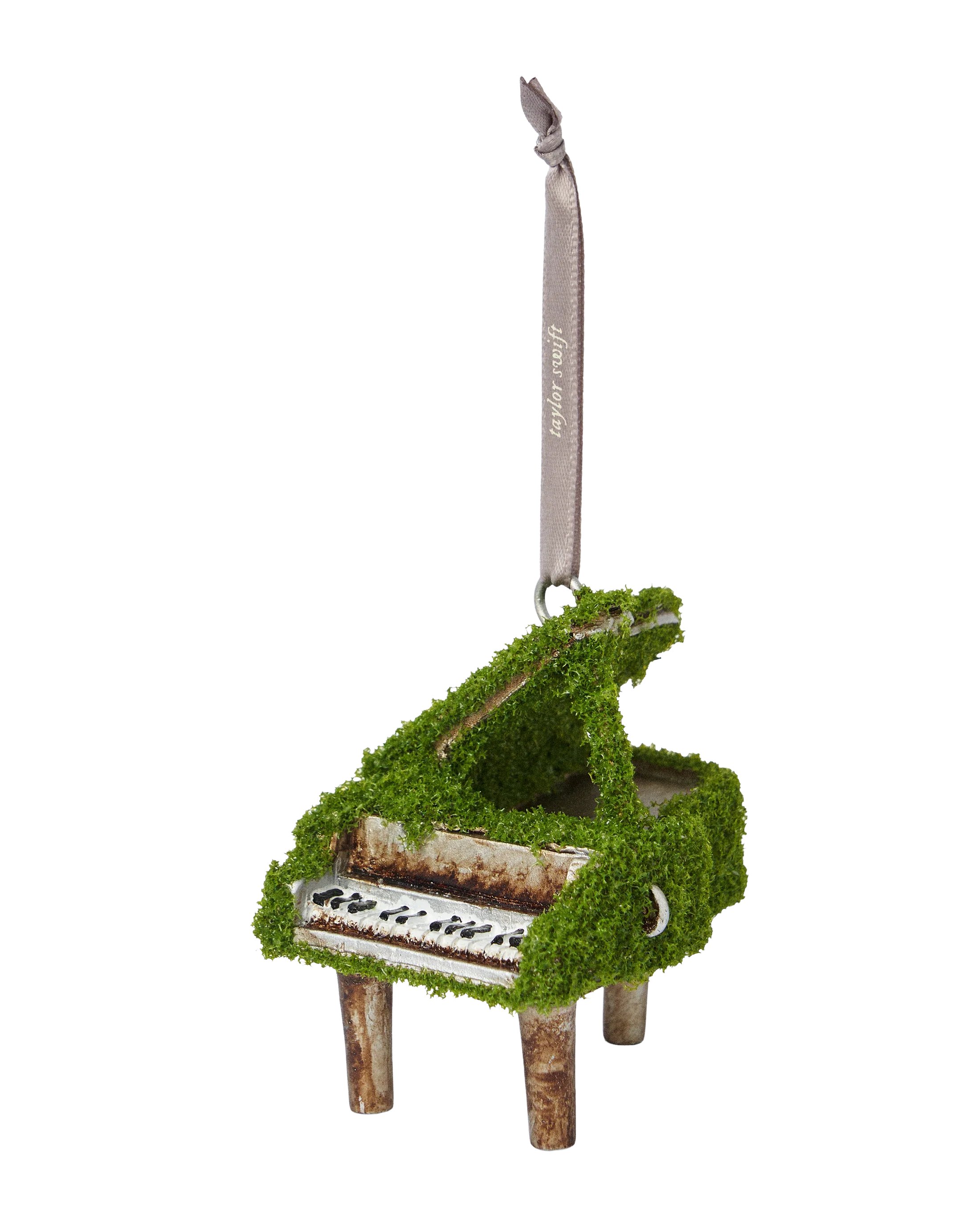 swiftpitch_uk's tweet card. Ships within 10 daysFaux moss piano ornament with "Taylor Swift" logo printed on gray ribbonResin, Iron, Polypropylene2.25"Limit 4 per order.This is not a toy. Keep out of reach of children and...