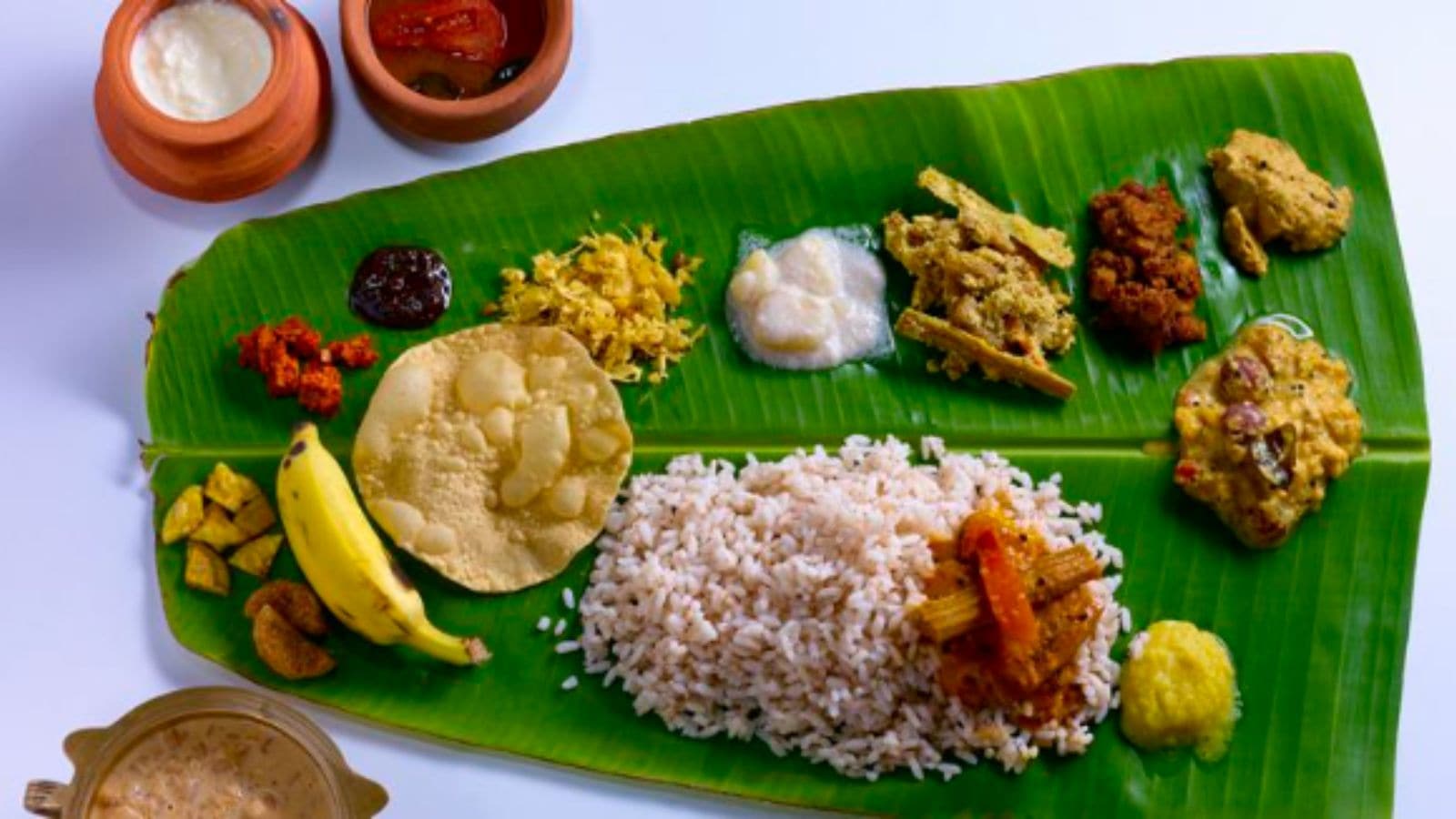 IndianExpress's tweet card. TDB president K Jayakumar said that pulao and sambar were earlier served at the hill shrine as part of annadanam, which was not appropriate for devotees.