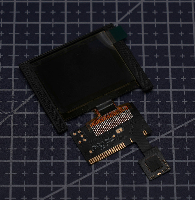 lectronz's tweet card. A new display module for the MZ-RH10. Replace your burnt out screen with a new one! (Soldering required!)