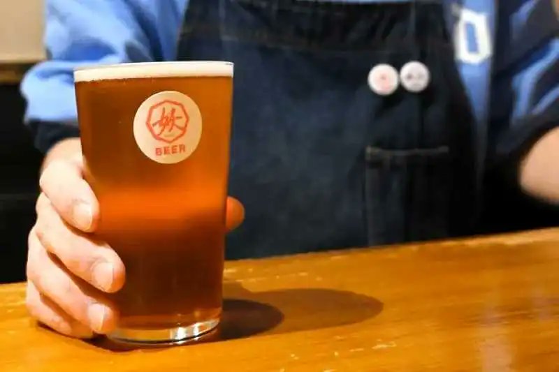 tripeat_hkd's tweet card. 北見市のマーケティング業「ロジカル」が、北見産トウモロコシを原料の一部としたクラフトビール「焦香童子（こがれ