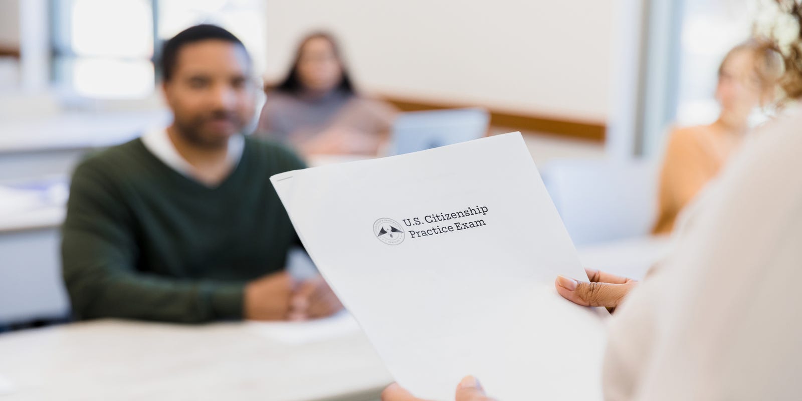 raystern's tweet card. The 2025 naturalization civics test includes additional questions on topics ranging from "American Innovation" to influential historical documents.