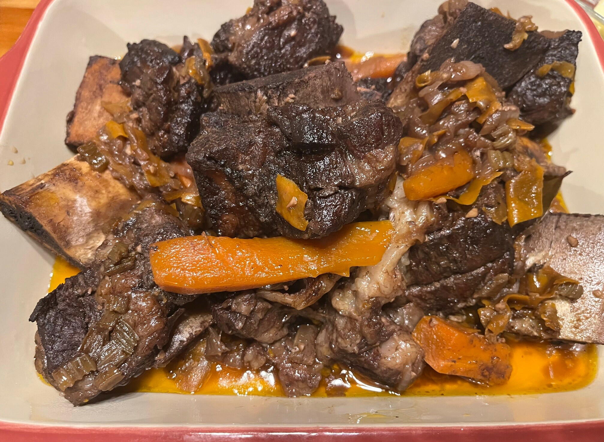 SlowCookRecipes's tweet card. "There’s nothing quite like the aroma of Braised Beef Short Ribs simmering in a Dutch oven to transform your kitchen into a cozy haven. This recipe brings together succulent beef short ribs, a savory...