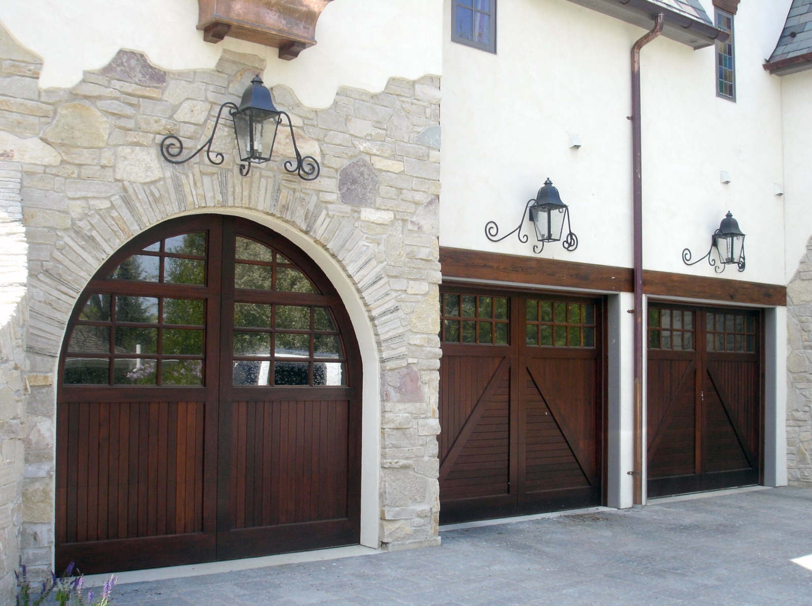 DesignerDoors's tweet card. Designing a new garage door is easier than you think. You just need to know the right question to ask yourself and the builder you are working with.