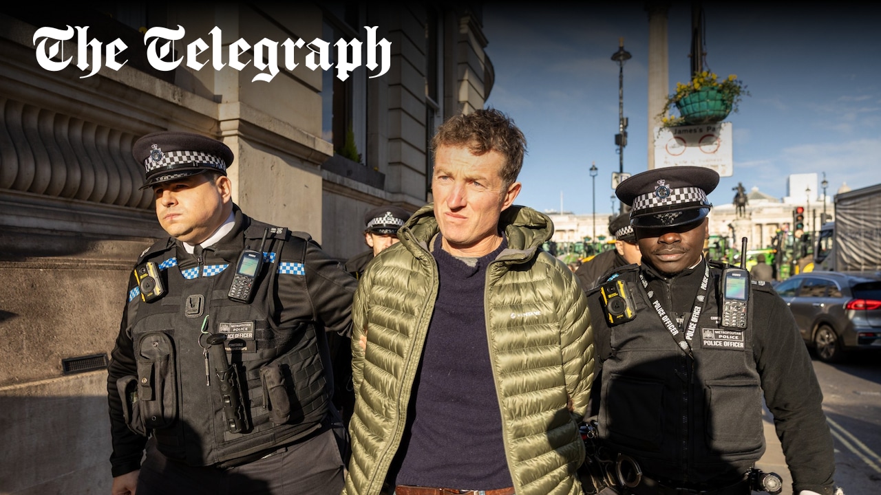 Togetherdec's tweet card. Met Police officers lead protesters away in handcuffs during demonstration against inheritance tax raid