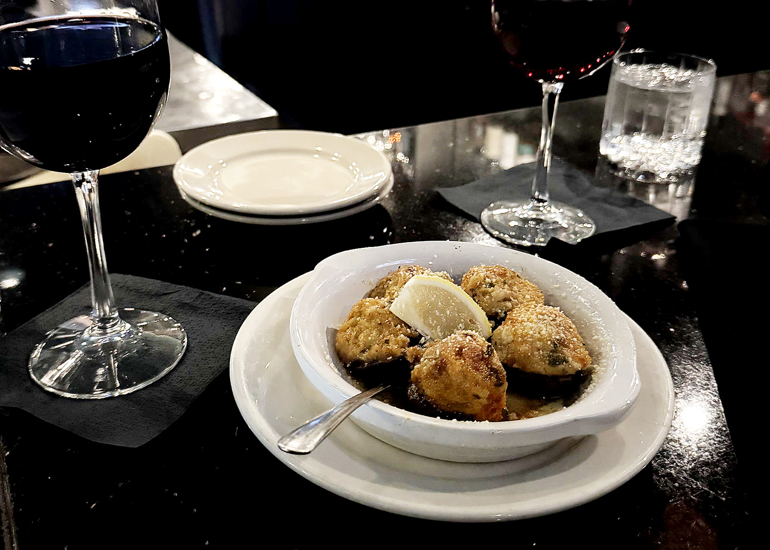 SignalAkron's tweet card. Signal Akron’s Patricia Sheahan says the complexity of flavors assembled in the crab stuffed mushrooms at Papa Joe's is satisfying.