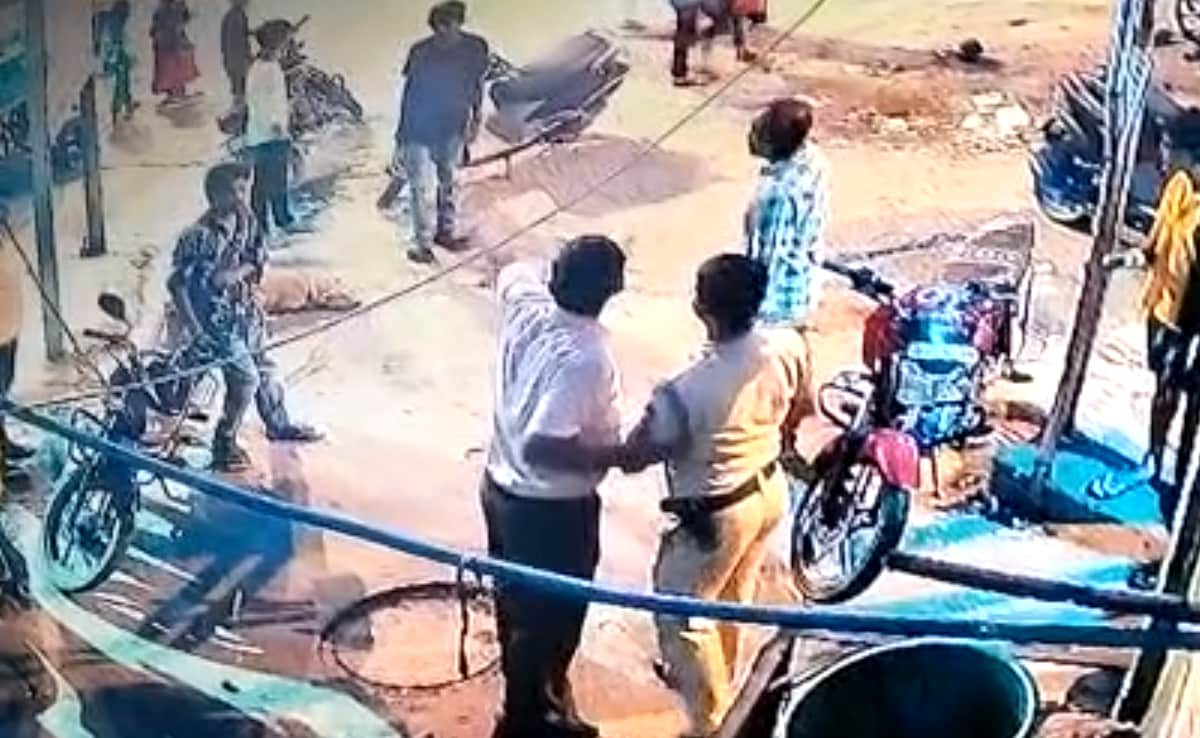 ProsaicView's tweet card. The video showed policeman Bhim Singh repeatedly trying to flee from the CBI team after realising that he was being raided.