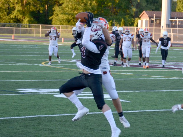 Blitz_OTH's tweet card. Concordia’s Tyler Grossman hauls in a catch along the sideline through the defense of Northrop’s Sebastian McCormick during a September 18 game at Zollner Stadium. “You should alw…