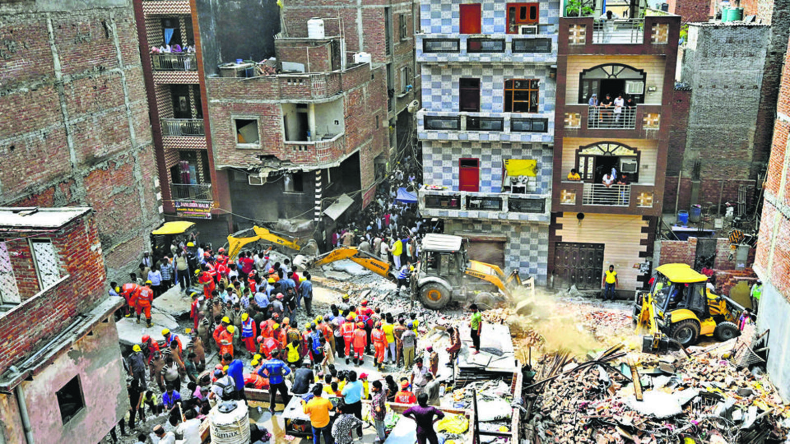 htTweets's tweet card. The building collapsed around 2.30am in Gali no 3 where houses stand cheek by jowl. Officials said 22 people were in the building at the time
