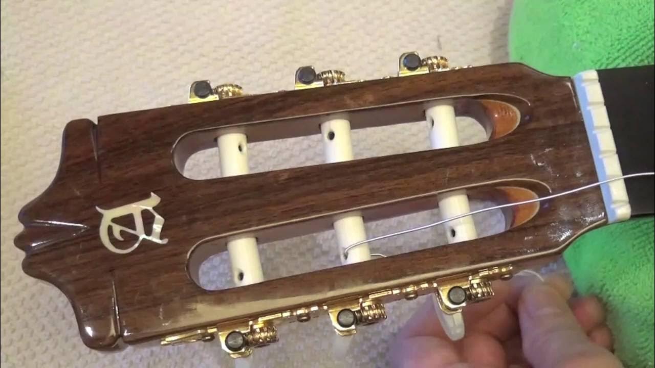 Alesavioz's tweet card. How to Restring your Classical Guitar - Changing Nylon Strings...