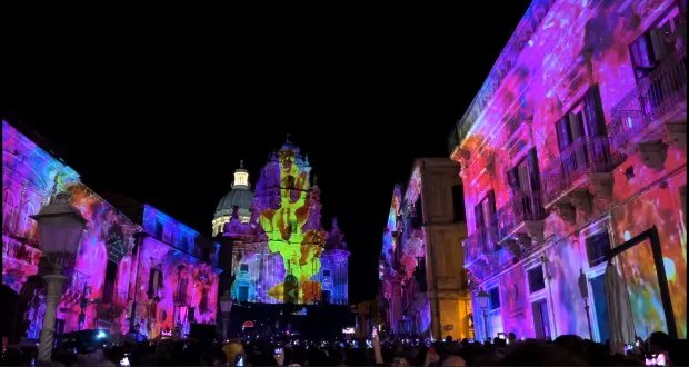 ZBandTech's tweet card. Fifteen Vivitek projectors mapped ecclesiastical works, paintings and outline sketches on to centuries-old buildings across three squares in support of the city's application.