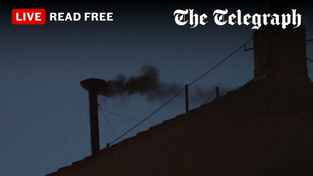 Telegraph's tweet card. Conclave: Black smoke over Sistine Chapel indicates no new pope