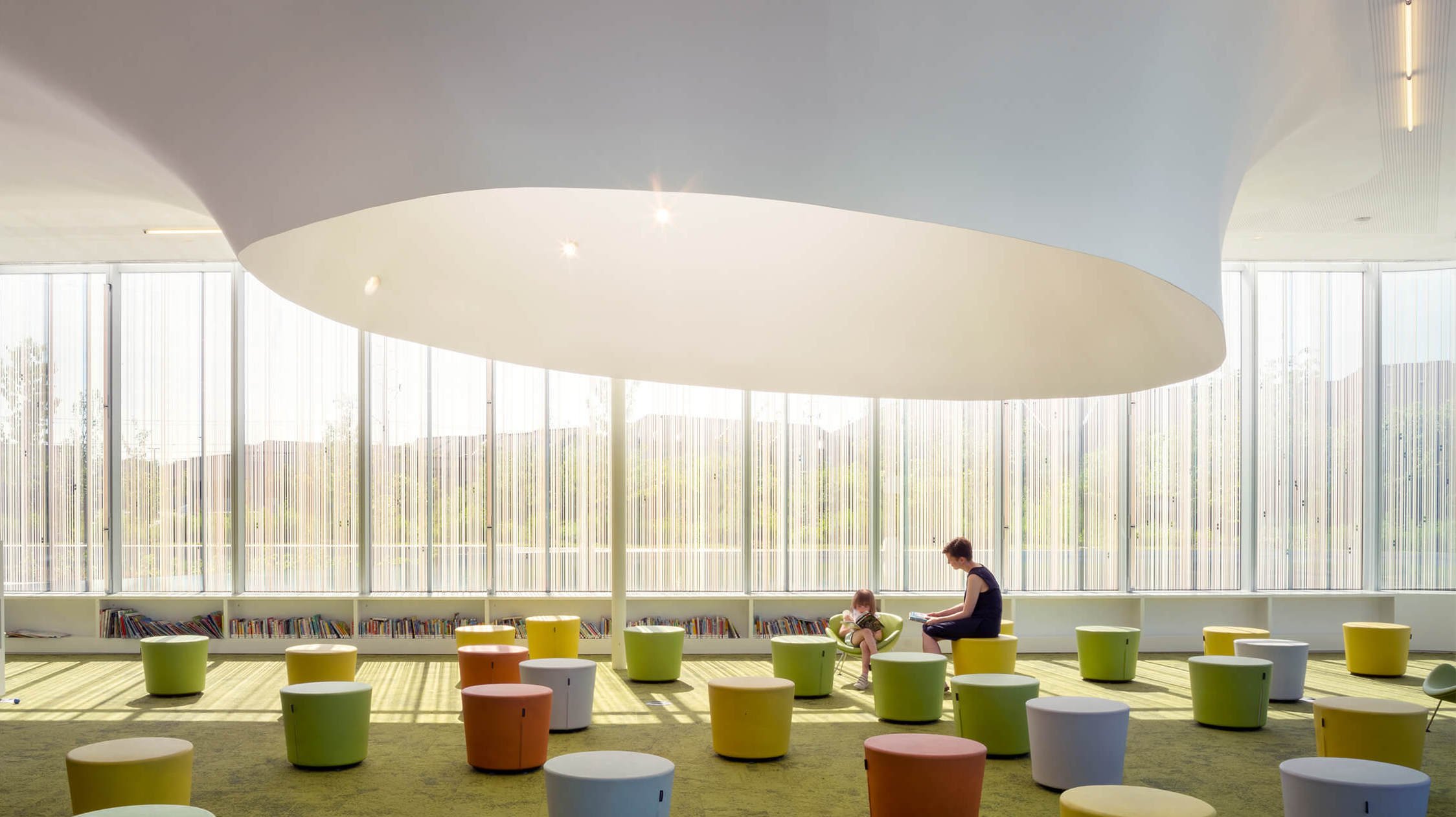 AzureMagazine's tweet card. The booming Toronto suburb of Brampton is now home to the Springdale Library – a sinuous and welcoming hub designed by RDH Architects.