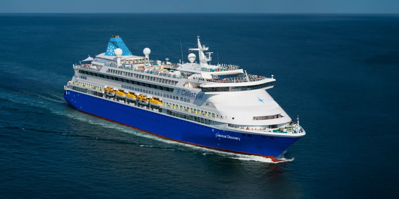 PamilVisions's tweet card. The Santorini cruise season begins with Celestyal Discovery's arrival, signaling the return of tourists on March 23.