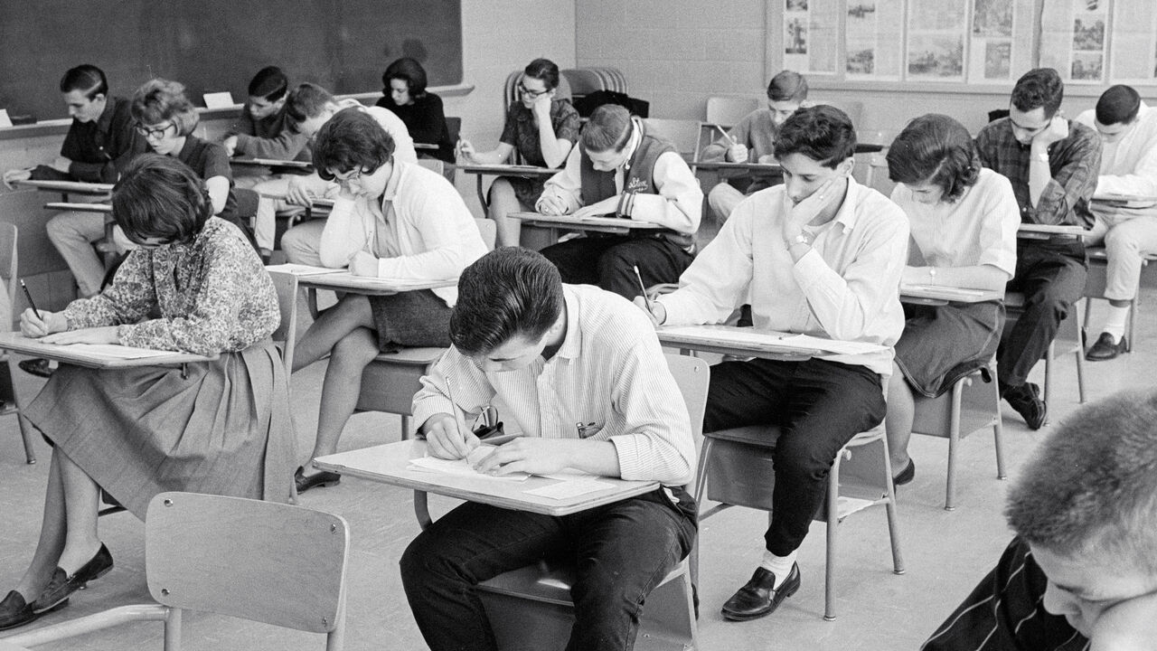 TheEconomist's tweet card. Handwritten and oral exams are making a comeback