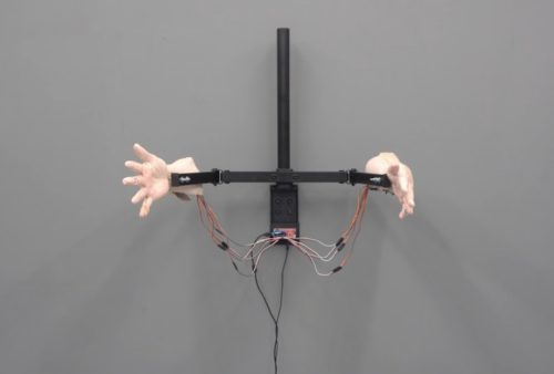 raspberrypi_otd's tweet card. This art installation features robot hands controlled by Raspberry Pi Zero WH. Social media data determines which actions the hands perform.