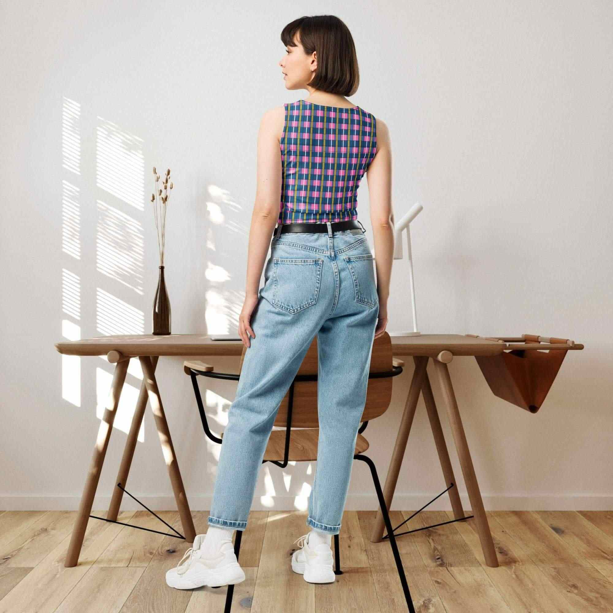 oneowlartist's tweet card. Redefine your style with this chic navy plaid crop top that hugs your curves just right. Perfect for pairing with high-waisted jeans, skirts, or more. Shop Now