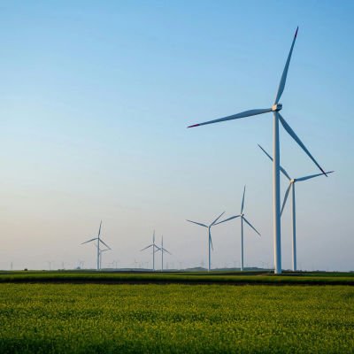 BlocksterCom's tweet card. Mint lists its $MINT token on BitMart, LBank, ProBit, and Weex, launching the world’s first tokenized compute platform powered by renewable energy.