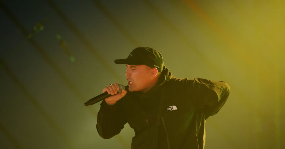 Moonzara's tweet card. Performer who goes by stage name ‘Mo Chara’ charged in relation to displaying flag in support of Hizbullah