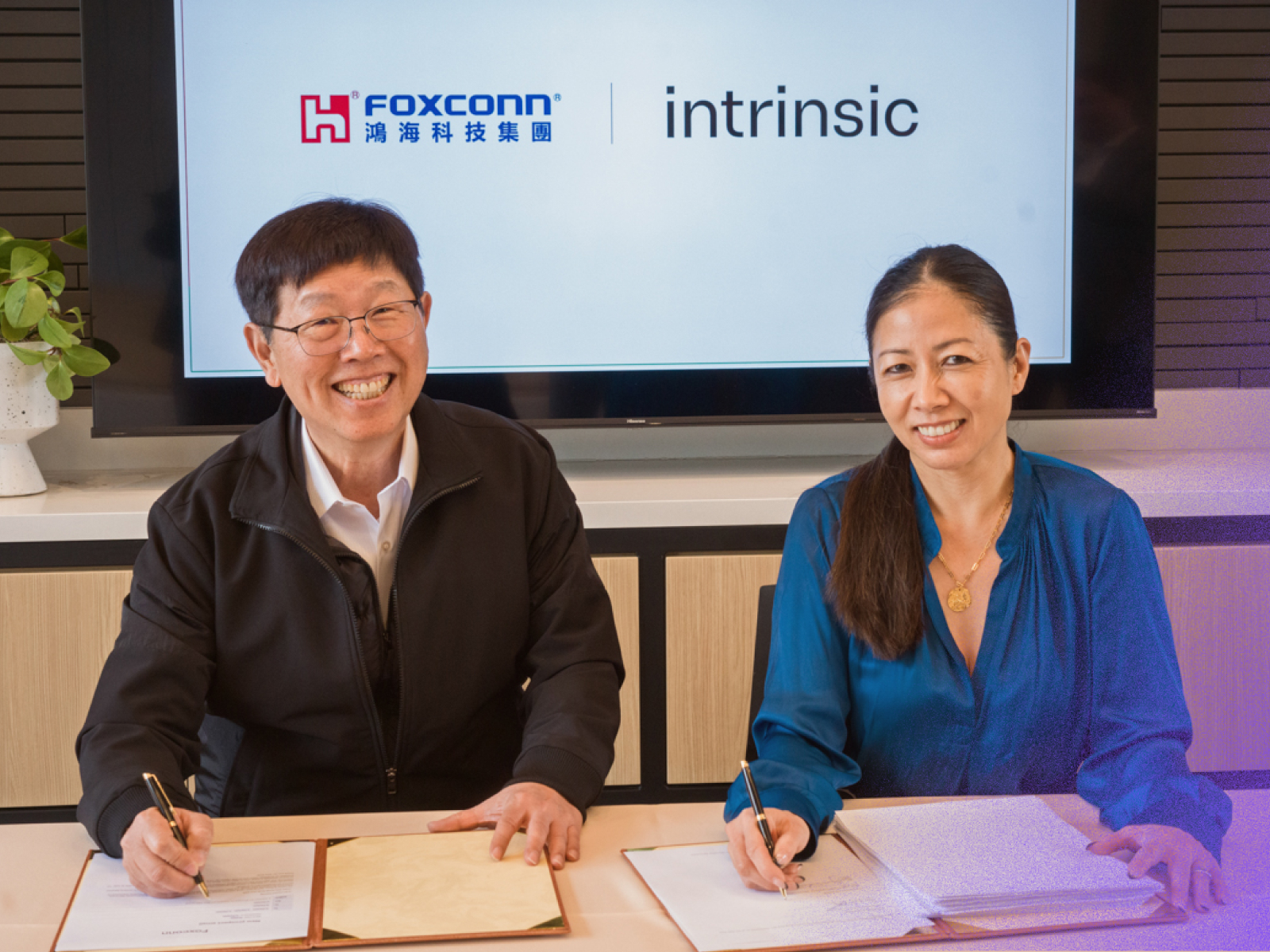 IntrinsicAI's tweet card. Foxconn and Intrinsic launch joint venture at Hon Hai Tech Day 2025