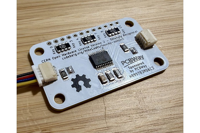 lectronz's tweet card. A Qwiic/STEMMA QT compatible breakout board for the AT42QT2120 12-key capacitive touch sensor