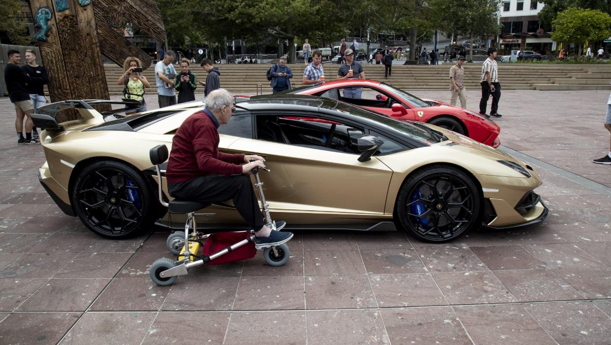 SugarTreeLane's tweet card. Queen St was closed on Saturday morning as a supercar rally took place.