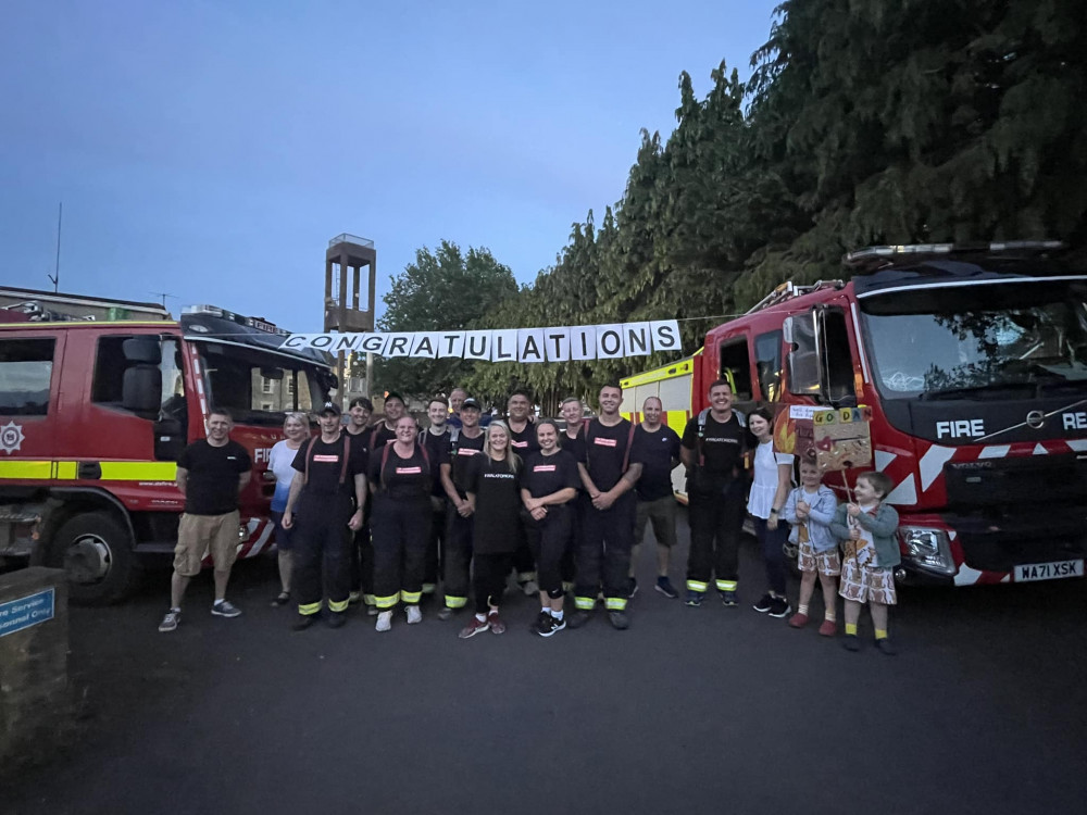 AxminsterNub's tweet card. A group of Axminster firefighters completed a 160-mile sponsored walk over the weekend, raising funds for specialist treatment for one of the crew's children.