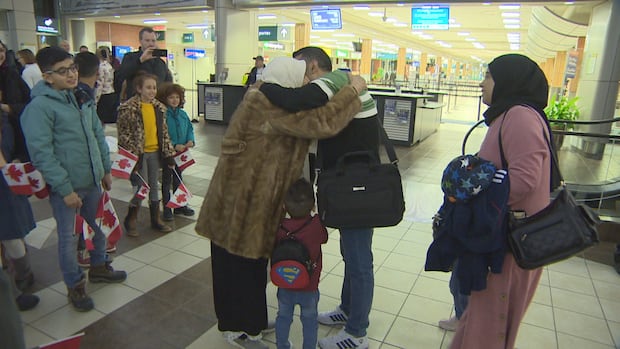 FelixM_Espc's tweet card. A cheer erupted in the Regina airport arrivals area as Syrian refugee Abdulnaser Alkhatib, 32, rushed into the arms of his frail mother, Fatema Abosalooa, who hadn't seen her son in years. A Regina...