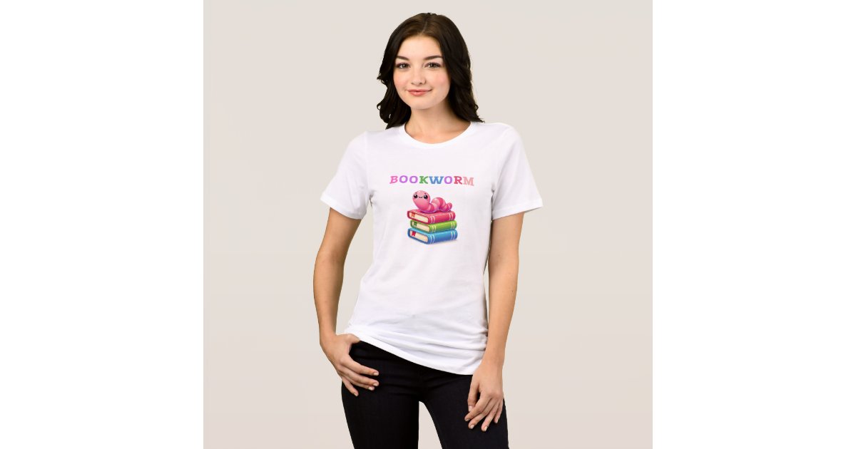 ShellsDesigns2's tweet card. Show off your literary love with our adorable "Bookworm Bliss" t-shirt! Featuring a charming pink bookworm perched atop a stack of colorful books, this design exudes a whimsical and delightful vibe....