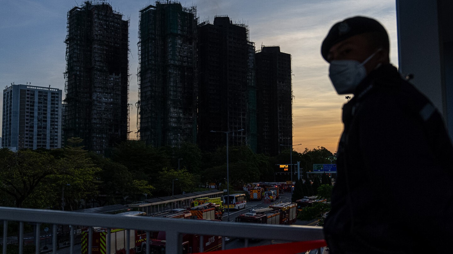 RealPhatsBlog's tweet card. Hong Kong firefighters have been searching a high-rise apartment complex after a massive fire killed at least 94 people.