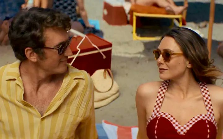 Snooper_Scope's tweet card. David Freyne’s Eternity steps into an imaginative realm where love transcends death, weaving a fantastical romance with philosophical undertones. This high-concept drama,