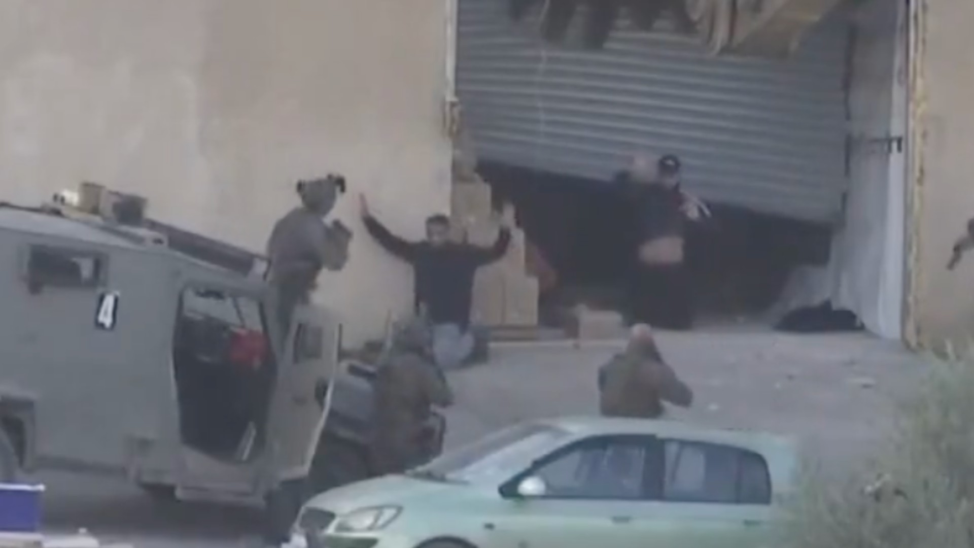 MiddleEastEye's tweet card. Video footage shows men in Jenin unarmed and complying before soldiers open fire