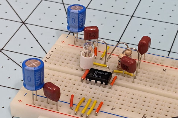 electronic_buzz's tweet card. Part 1 of this article discussed history of Wien bridge oscillator & its theory of operation, while exploring simulations with idealized circuit elements.