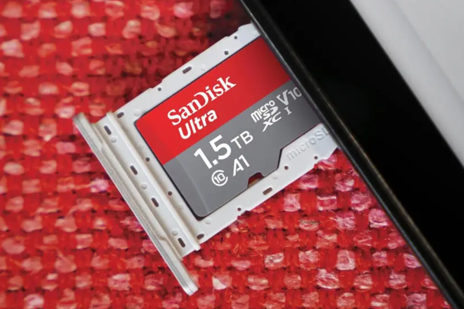StuffTV's tweet card. 1.5TB on something smaller than your thumb for less than £100? The SanDisk Ultra microSD card is essential for Steam Deck and Switch 2 owners.