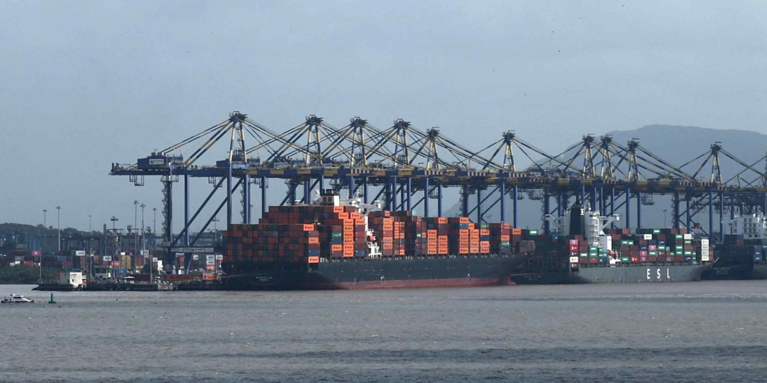 NikkeiAsia's tweet card. Expansion beats market forecast, exceeds central bank annual target