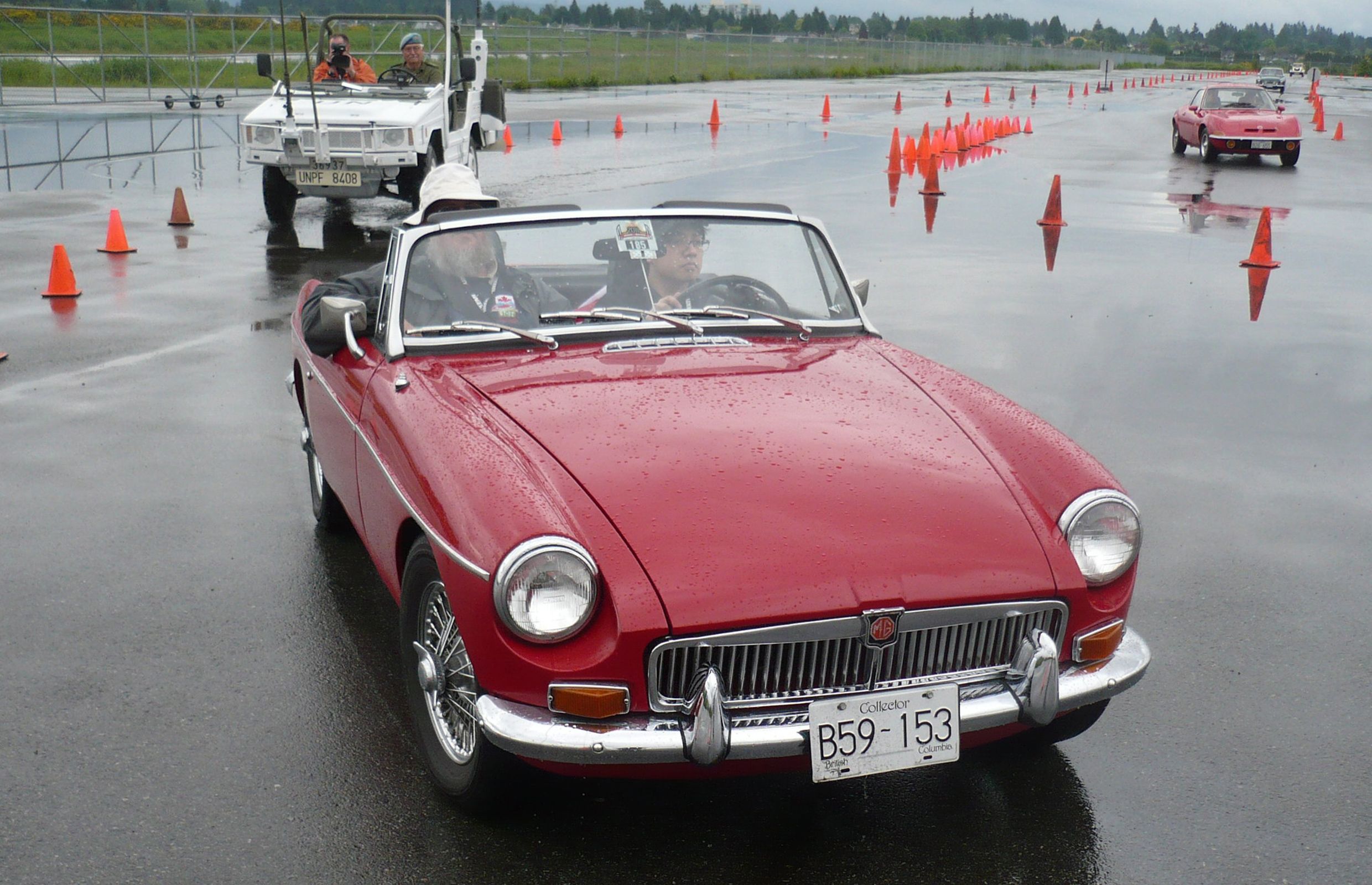 DrivingSoftware's tweet card. Young drivers learn to drive stick in gorgeous classic cars