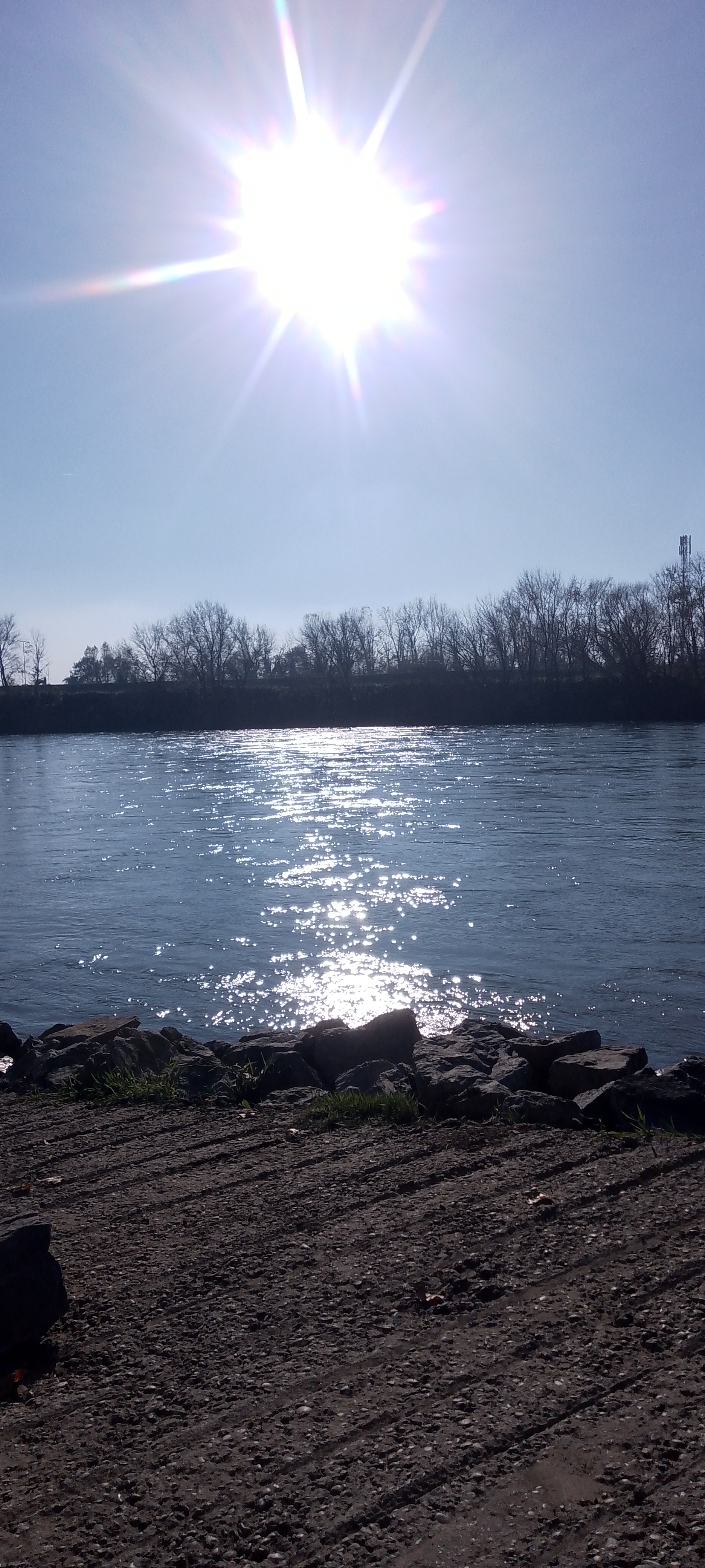LukaJagor's tweet card. Sunlight over river