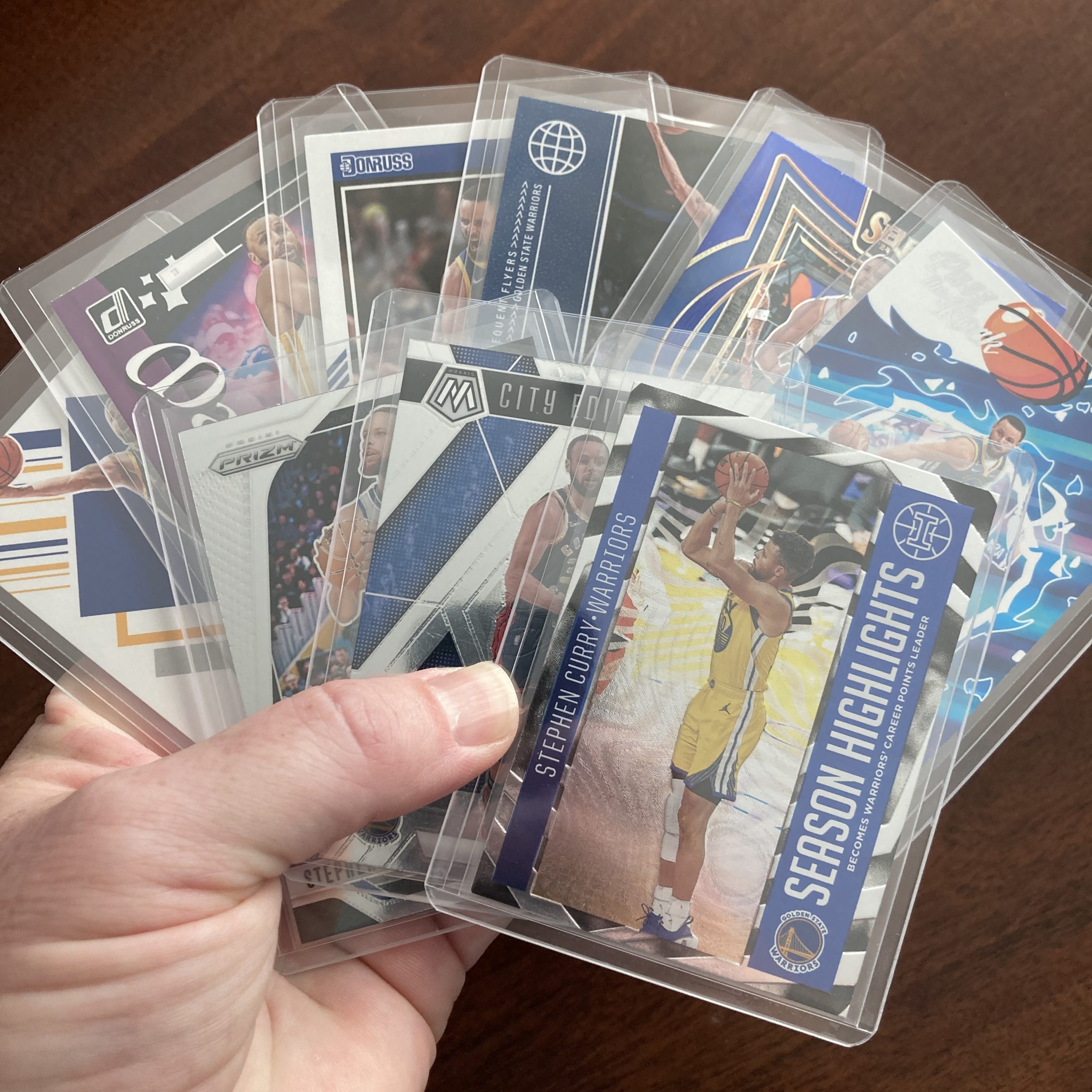 SlamSportsCards's tweet card. Curated pack of nine different Stephen Curry basketball cards including a Panini Illusions holofoil insert card with other base and insert cards. Nice instant collection bundle of cards for a baske…