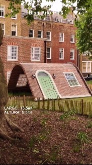 orviton's tweet card. Fachada ondulada de Alex Chinneck