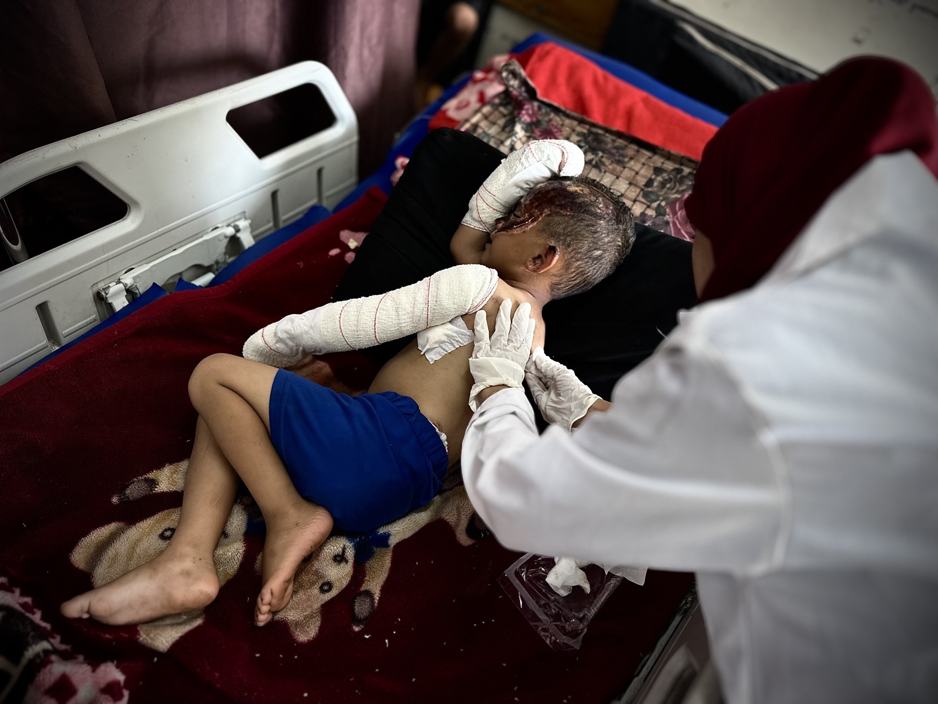 News_The_Voice's tweet card. At least 13 starving people seeking aid killed by Israel today, part of the overall death toll of 32.