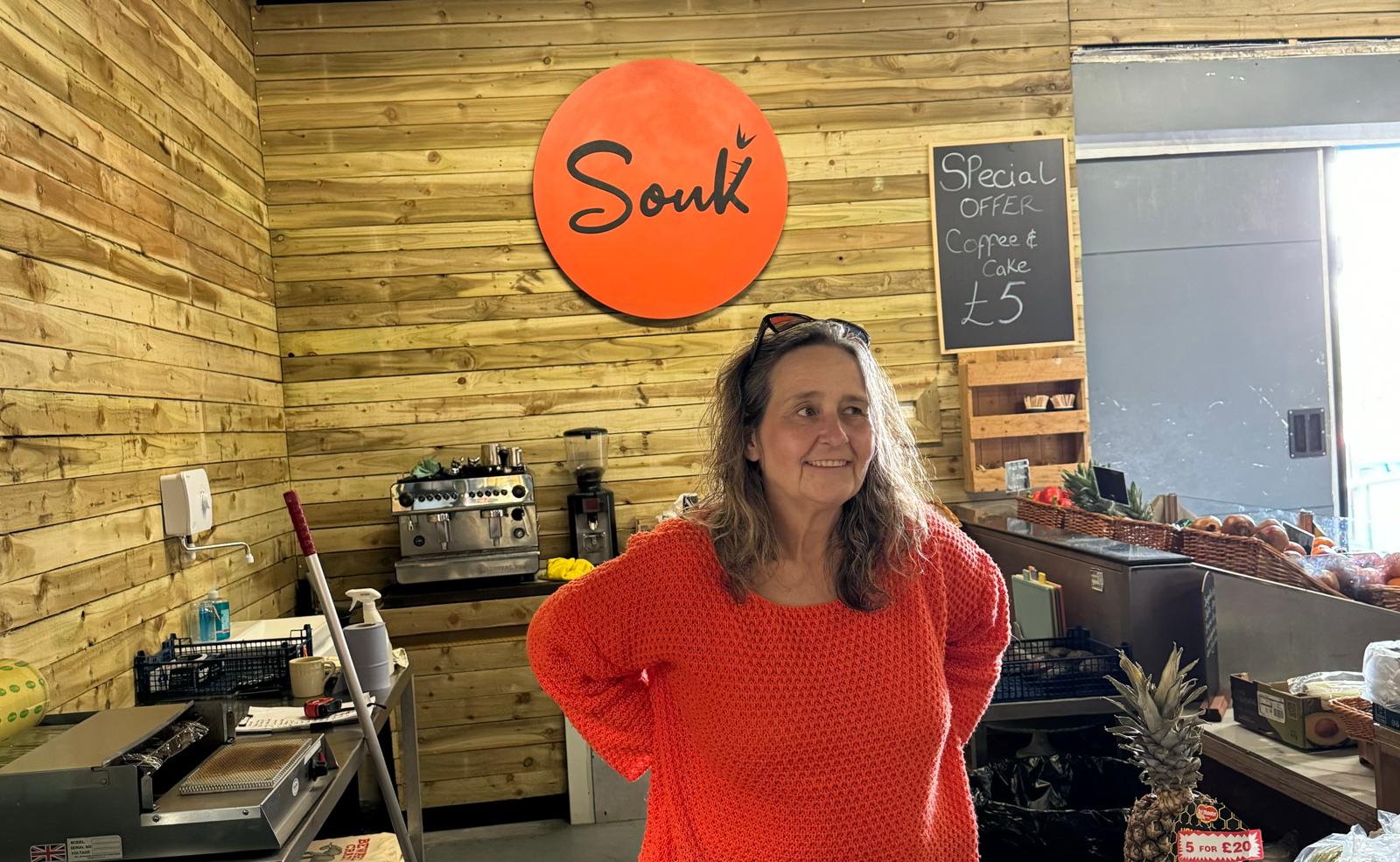 OptimistMag's tweet card. A female greengrocer learns how to rebuild her life and business after her husband stepped out of the family