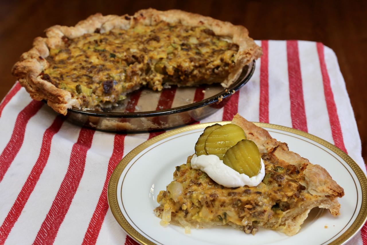 webmozart's tweet card. Looking to learn how to make the best homemade pickle pie? This flaky & savoury American pie features dill pickles, minced beef, cheese and fried onions.