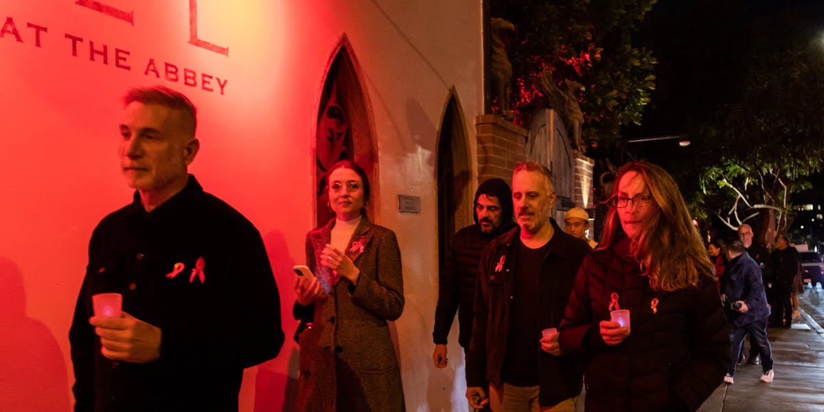 Phil_Lewis_'s tweet card. We have the means to eradicate AIDS as a threat to human life. Greed is keeping this from happening.