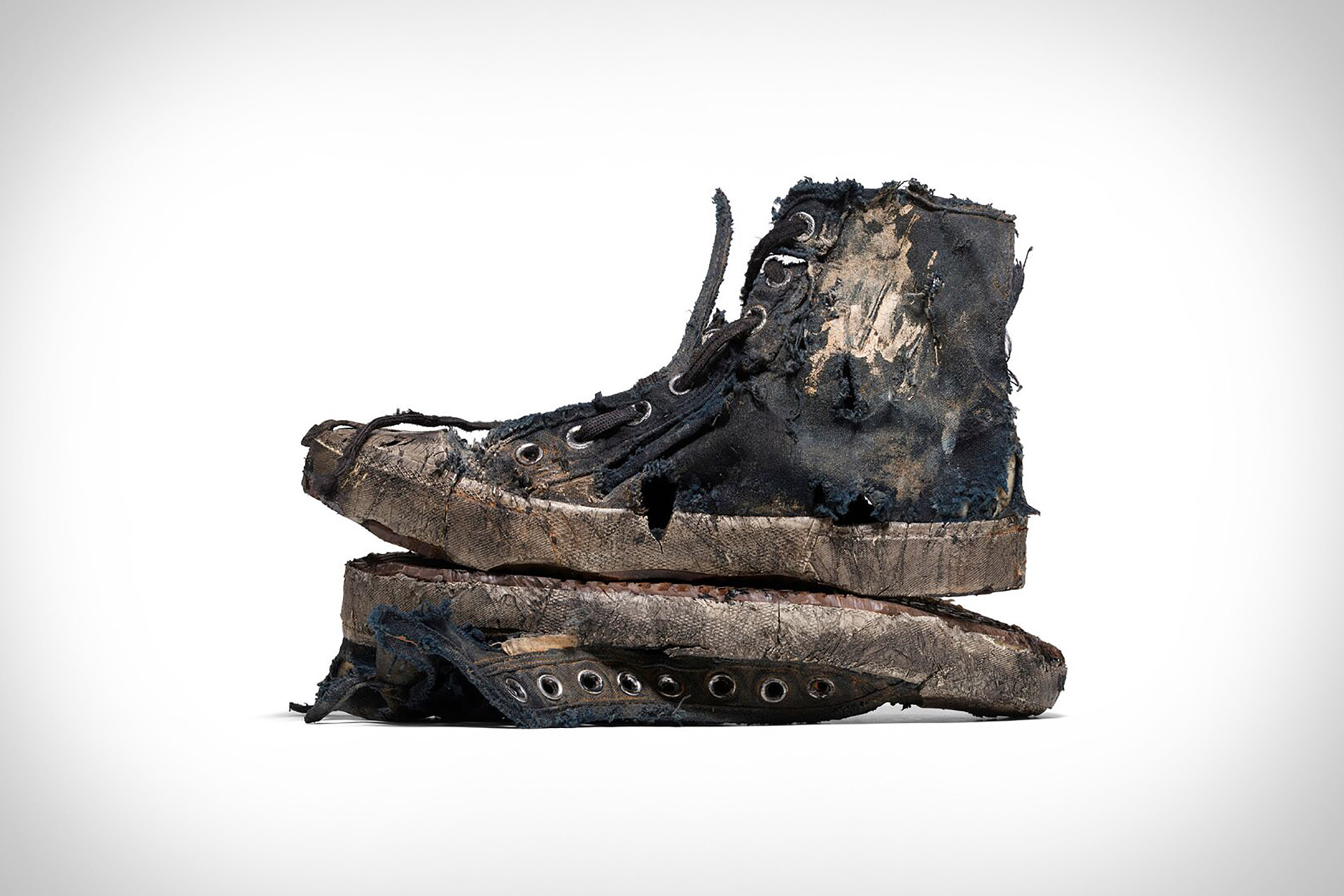 waltdelph's tweet card. For its Paris Sneaker, Balenciaga bypasses distressed and goes straight for destroyed. The limited-edition version of its new silhouette comes aged with decades-worth of wear, featuring holes,...