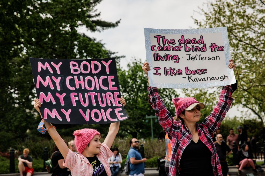 wbgames's tweet card. Media companies are paying employees' travel costs for out-of-state procedures.