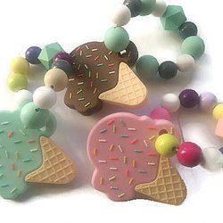 PregnancyMag's tweet card. Two Brothers and Olivia’s products ($4.95+) are fabulous. The teethers and play toys arrived in a playful paper treat bag. When my older daughter saw me opening the package, she asked to eat one of...