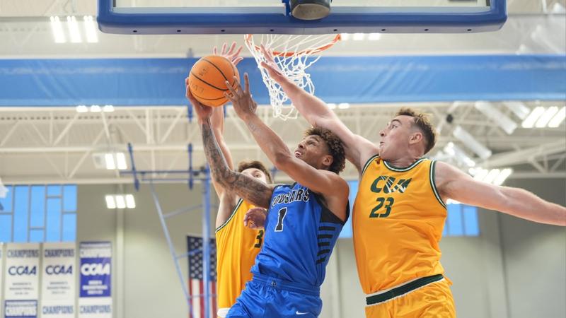 CSUSM_MBB's tweet card. The Cal State San Marcos men's basketball team (0-1) opened the 2025–26 campaign with a 77-74 overtime loss to Concordia University Irvine (1-0) on Friday afternoon at The Sports Center.