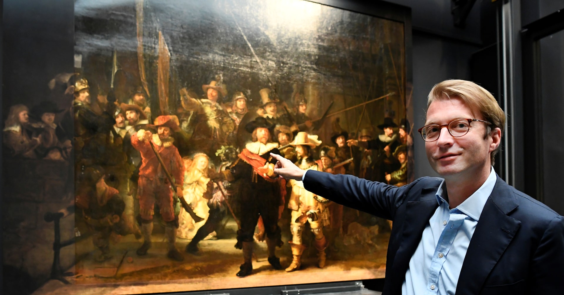 amber_script's tweet card. For the first time in 300 years, Rembrandt's famed "The Night Watch" is back on display in what researchers say is its original size, with missing parts temporarily restored in an exhibition aided by...