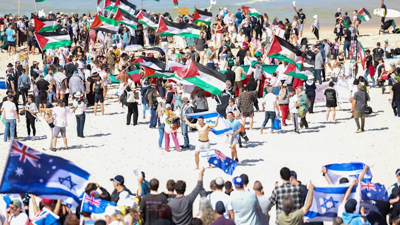 MikeCarlton01's tweet card. A protest and counter-protests were separated by a heavy police contingent but still the two sides traded blows and shouted at one another. 